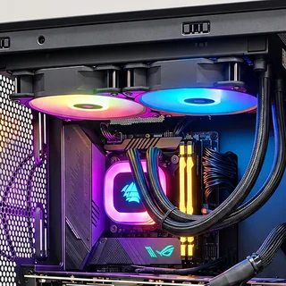 Illuminated cooling fans inside a desktop computer.